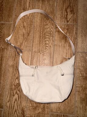 Lululemon Cream Saddle Purse